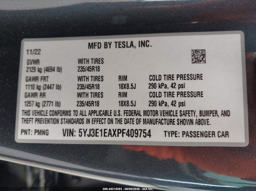 2023 Tesla Model 3 VIN 5YJ3E1EAXPF409754 IAAI salvage auction — FRONT & REAR, Salvage Title, sold $7,700 on 2026-07-07 (photo 9)