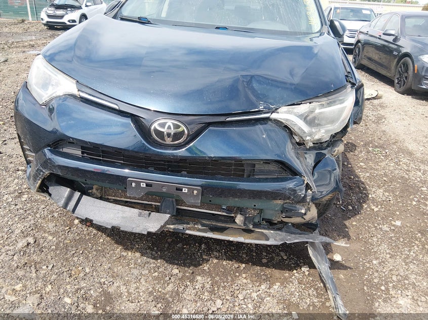 2018 Toyota Rav 4 VIN JTMBFREV9JJ198217 IAAI salvage auction — FRONT END, Salvage Title, sold $4,050 on 2026-07-26 (photo 6)