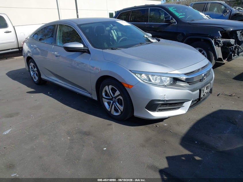 2018 Honda Civic VIN 2HGFC2F56JH538068 IAAI salvage auction — FRONT & REAR, Salvage Title, sold $5,600 on 2026-08-06 (photo 1)