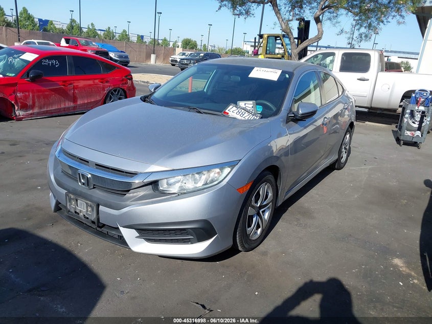 2018 Honda Civic VIN 2HGFC2F56JH538068 IAAI salvage auction — FRONT & REAR, Salvage Title, sold $5,600 on 2026-08-06 (photo 2)
