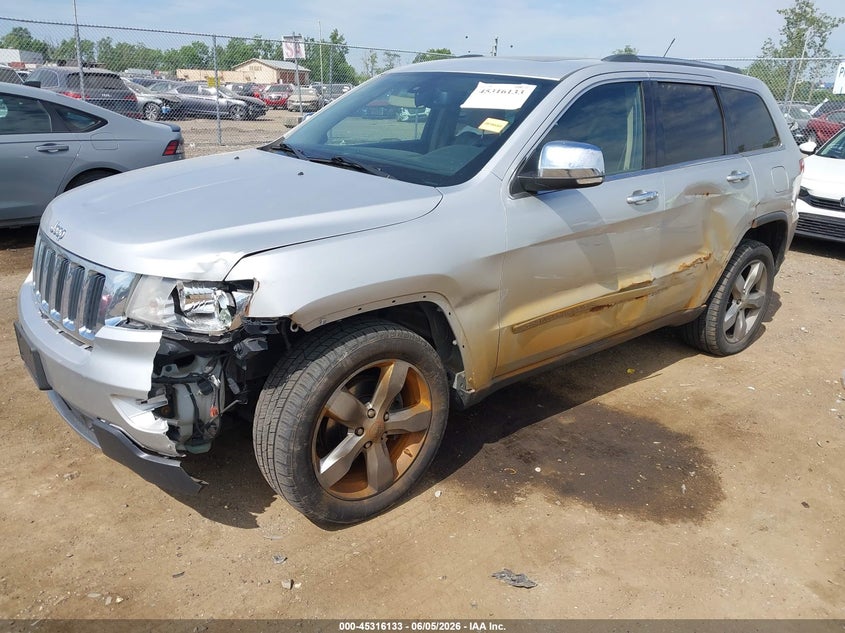 2013 Jeep Grand cherokee VIN 1C4RJFBG2DC582141 IAAI salvage auction — LEFT SIDE, Salvage (Ohio), sold $950 on 2026-08-01 (photo 2)