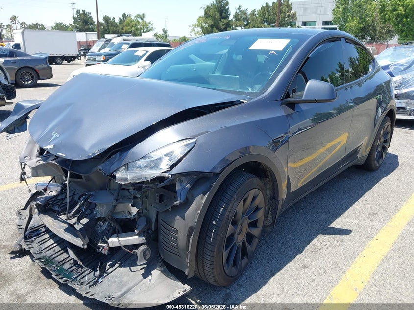2023 Tesla Model y VIN 7SAYGDEE4PA028874 IAAI salvage auction — FRONT END, Salvage Title, sold $8,900 on 2026-07-06 (photo 2)