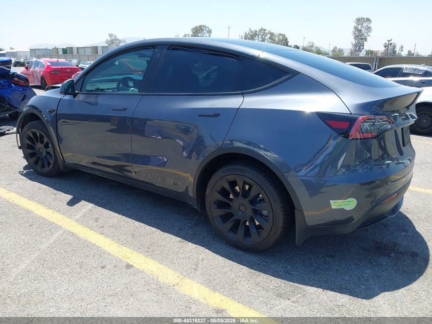 2023 Tesla Model y VIN 7SAYGDEE4PA028874 IAAI salvage auction — FRONT END, Salvage Title, sold $8,900 on 2026-07-06 (photo 3)