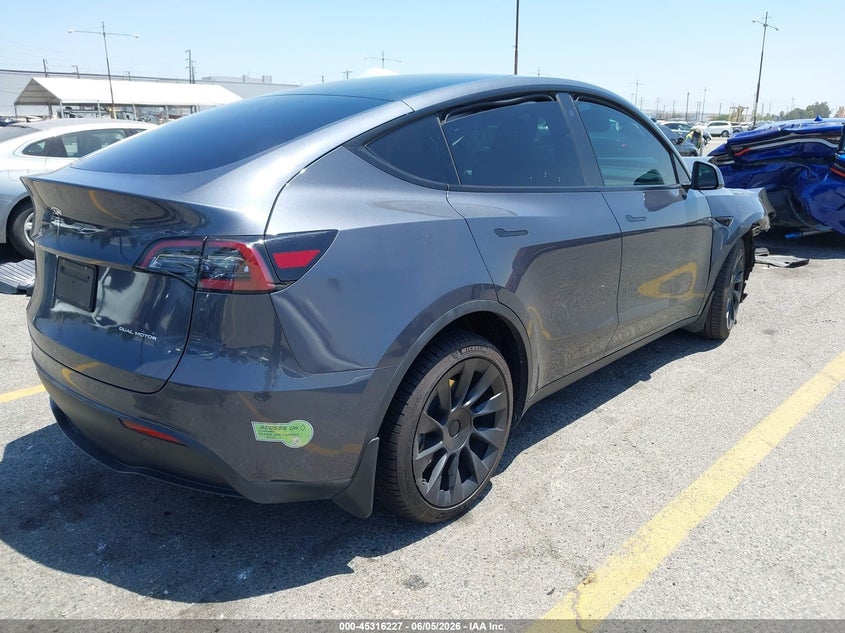 2023 Tesla Model y VIN 7SAYGDEE4PA028874 IAAI salvage auction — FRONT END, Salvage Title, sold $8,900 on 2026-07-06 (photo 4)