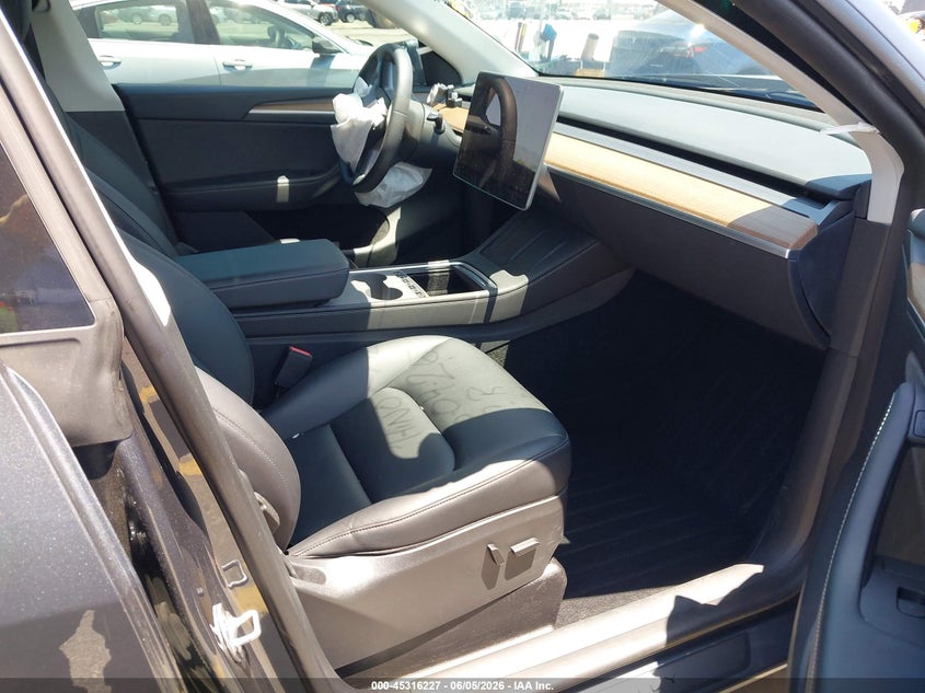 2023 Tesla Model y VIN 7SAYGDEE4PA028874 IAAI salvage auction — FRONT END, Salvage Title, sold $8,900 on 2026-07-06 (photo 5)