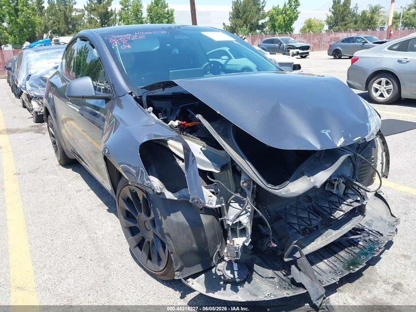 2023 Tesla Model y VIN 7SAYGDEE4PA028874 IAAI salvage auction — FRONT END, Salvage Title, sold $8,900 on 2026-07-06 (photo 6)
