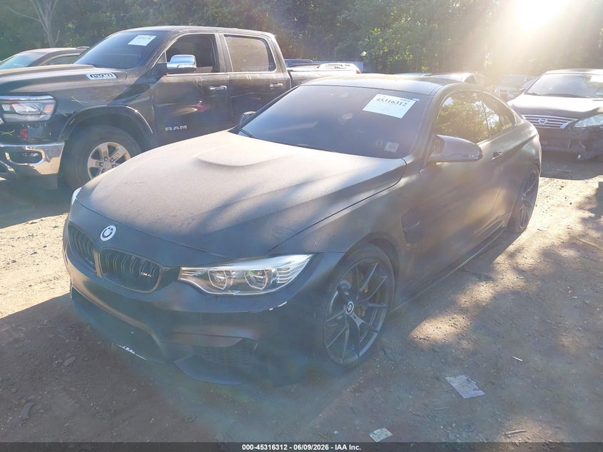 2015 BMW M4 VIN WBS3R9C55FK329507 IAAI salvage auction — WATER/FLOOD, Salvage Title, sold $11,250 on 2026-08-04 (photo 2)