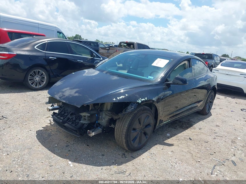 2026 Tesla Model 3 VIN 5YJ3E1EA6TF149069 IAAI salvage auction — FRONT & REAR, Salvage Title, sold $12,600 on 2026-08-02 (photo 2)