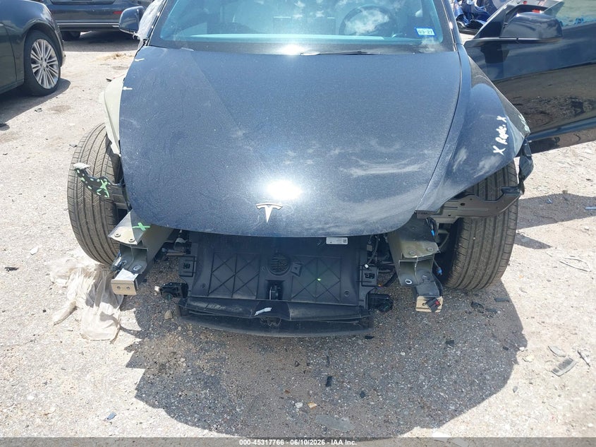 2026 Tesla Model 3 VIN 5YJ3E1EA6TF149069 IAAI salvage auction — FRONT & REAR, Salvage Title, sold $12,600 on 2026-08-02 (photo 6)