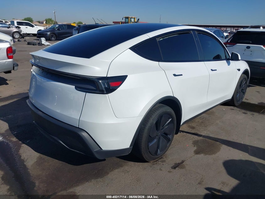2026 Tesla Model y VIN 7SAYGDED2TA475611 IAAI salvage auction — SIDE, Salvage Title, sold $16,000 on 2026-07-15 (photo 4)