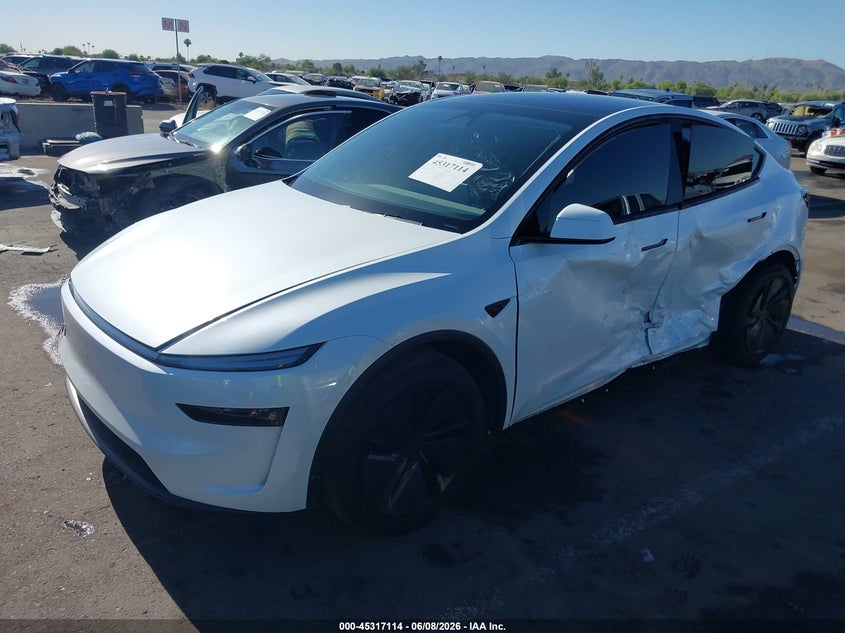 2026 Tesla Model y VIN 7SAYGDED2TA475611 IAAI salvage auction — SIDE, Salvage Title, sold $16,000 on 2026-07-15 (photo 6)