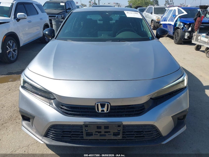 2023 Honda Civic VIN 2HGFE2F55PH533947 IAAI salvage auction — HAIL, Salvage Title, sold $10,500 on 2026-07-29 (photo 6)