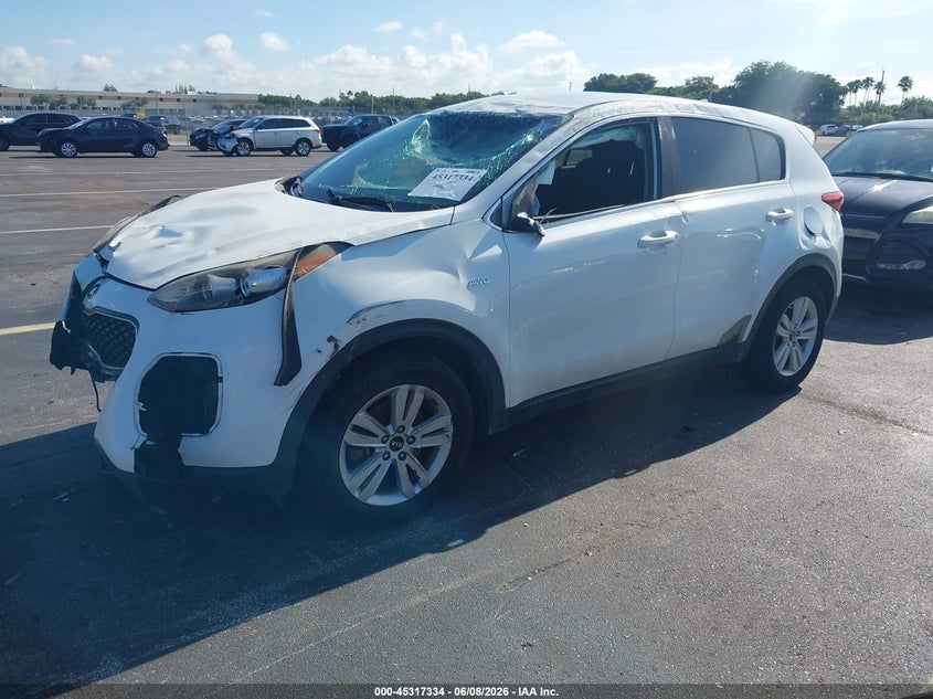 2018 Kia Sportage VIN KNDPMCAC2J7354334 IAAI salvage auction — ALL OVER, Salvage Title, sold $1,250 on 2026-07-09 (photo 2)
