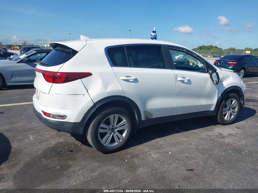 2018 Kia Sportage VIN KNDPMCAC2J7354334 IAAI salvage auction — ALL OVER, Salvage Title, sold $1,250 on 2026-07-09 (photo 4)