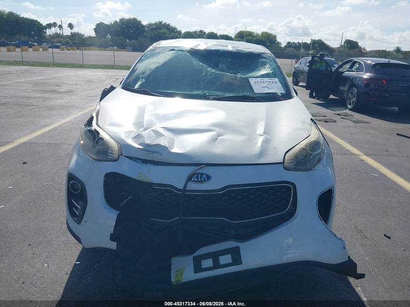 2018 Kia Sportage VIN KNDPMCAC2J7354334 IAAI salvage auction — ALL OVER, Salvage Title, sold $1,250 on 2026-07-09 (photo 6)