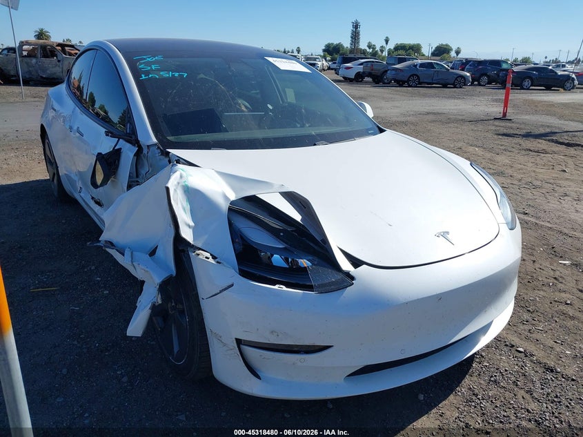 2021 Tesla Model 3 VIN 5YJ3E1EB4MF009208 IAAI salvage auction — SIDE, Salvage Title, sold $5,100 on 2026-07-28 (photo 1)