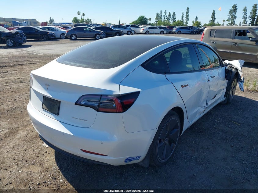 2021 Tesla Model 3 VIN 5YJ3E1EB4MF009208 IAAI salvage auction — SIDE, Salvage Title, sold $5,100 on 2026-07-28 (photo 4)