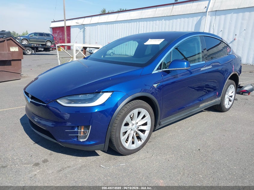 2018 Tesla Model x VIN 5YJXCDE20JF114123 IAAI salvage auction — LEFT REAR, Salvage (Oregon), sold $9,025 on 2026-08-27 (photo 2)