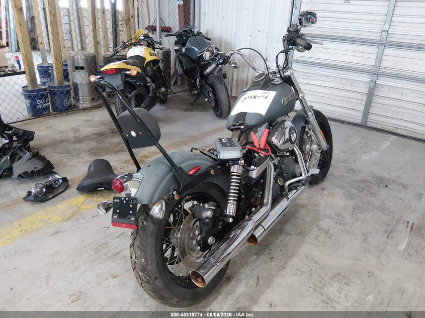 2012 Harley-davidson Street bob VIN 1HD1GX413CC336089 IAAI salvage auction — NORMAL WEAR, Salvage Title, sold $1,050 on 2026-09-07 (photo 4)