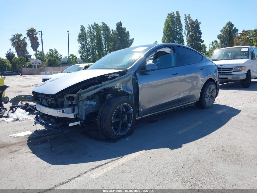 2026 Tesla Model y VIN 7SAYGDEE3TF544558 IAAI salvage auction — LEFT FRONT, Salvage Title, sold $16,950 on 2026-07-20 (photo 2)