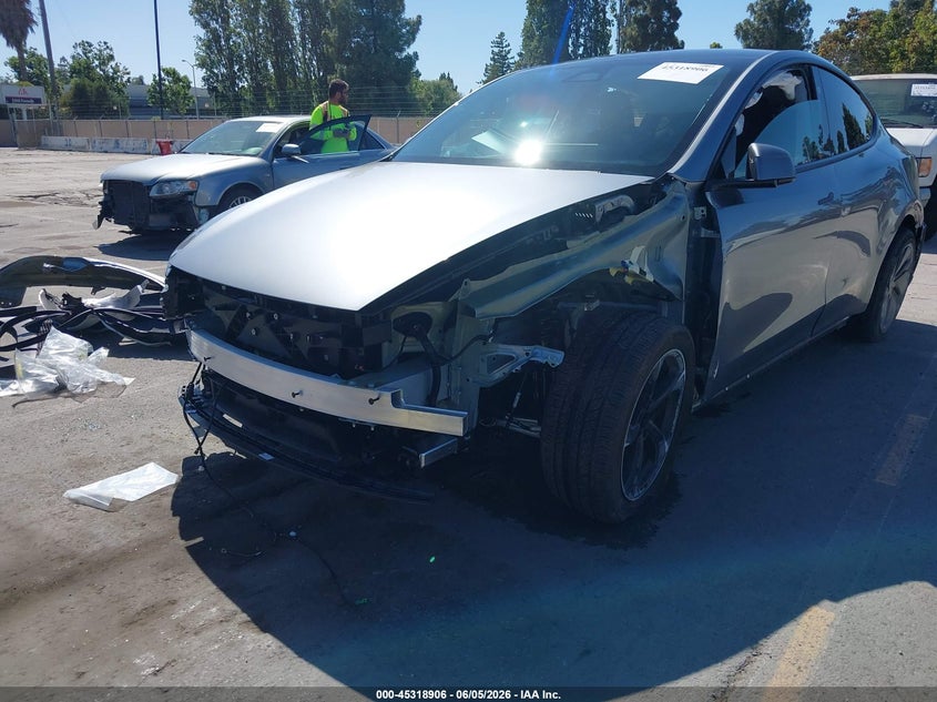 2026 Tesla Model y VIN 7SAYGDEE3TF544558 IAAI salvage auction — LEFT FRONT, Salvage Title, sold $16,950 on 2026-07-20 (photo 6)