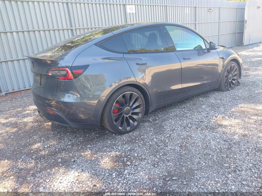 2021 Tesla Model y VIN 5YJYGDEF5MF121536 IAAI salvage auction — FRONT END, Salvage Title, sold $13,900 on 2026-07-15 (photo 4)
