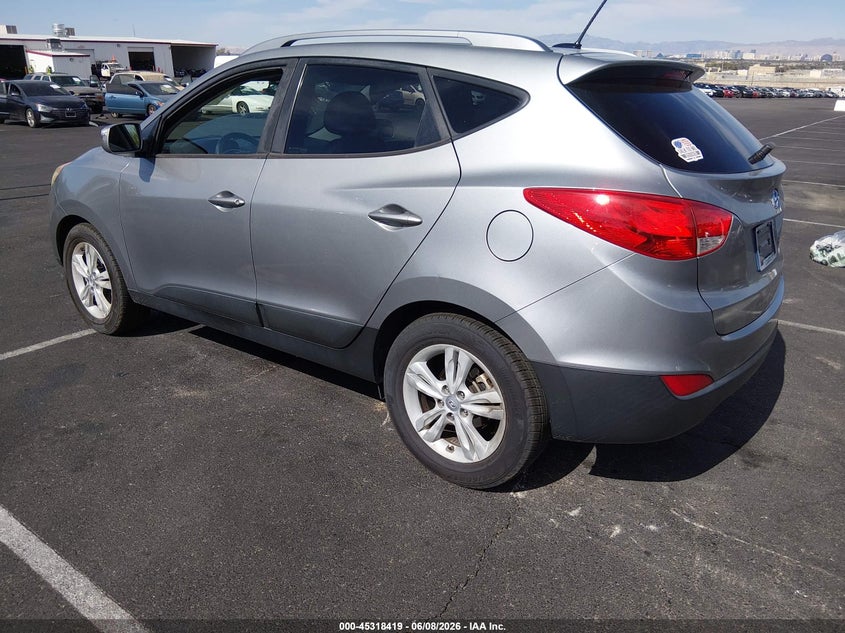 2013 Hyundai Tucson VIN KM8JU3AC7DU550602 IAAI salvage auction — SIDE, Salvage Title, sold $1,550 on 2026-07-25 (photo 3)