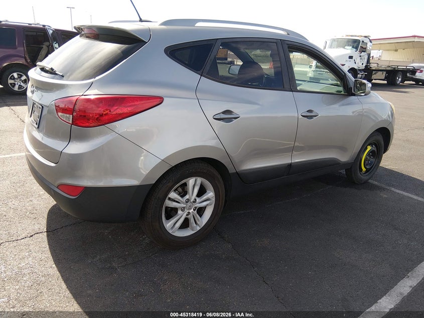 2013 Hyundai Tucson VIN KM8JU3AC7DU550602 IAAI salvage auction — SIDE, Salvage Title, sold $1,550 on 2026-07-25 (photo 4)