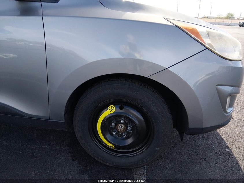 2013 Hyundai Tucson VIN KM8JU3AC7DU550602 IAAI salvage auction — SIDE, Salvage Title, sold $1,550 on 2026-07-25 (photo 6)
