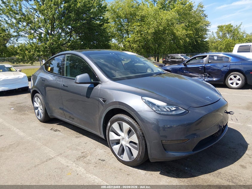 2023 Tesla Model y VIN 7SAYGDEE5PA040693 IAAI salvage auction — BIO HAZARD, Salvage Title, sold $18,800 on 2026-07-13 (photo 1)