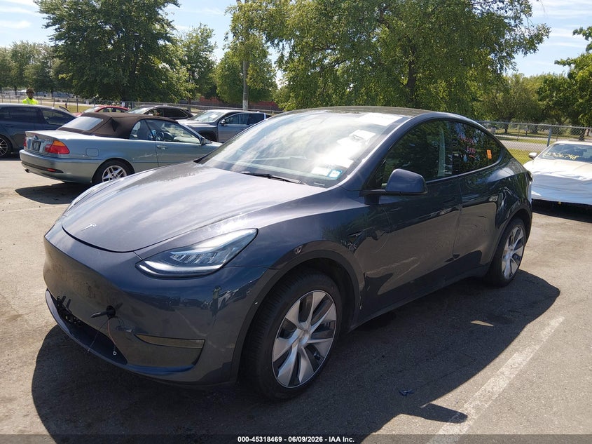 2023 Tesla Model y VIN 7SAYGDEE5PA040693 IAAI salvage auction — BIO HAZARD, Salvage Title, sold $18,800 on 2026-07-13 (photo 2)
