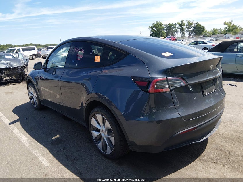2023 Tesla Model y VIN 7SAYGDEE5PA040693 IAAI salvage auction — BIO HAZARD, Salvage Title, sold $18,800 on 2026-07-13 (photo 3)