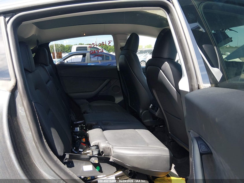 2023 Tesla Model y VIN 7SAYGDEE5PA040693 IAAI salvage auction — BIO HAZARD, Salvage Title, sold $18,800 on 2026-07-13 (photo 8)
