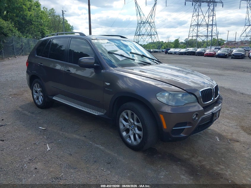 2012 BMW X5 VIN 5UXZV4C5XCL748702 IAAI salvage auction — LEFT SIDE, Salvage Title, sold $725 on 2026-07-10 (photo 1)