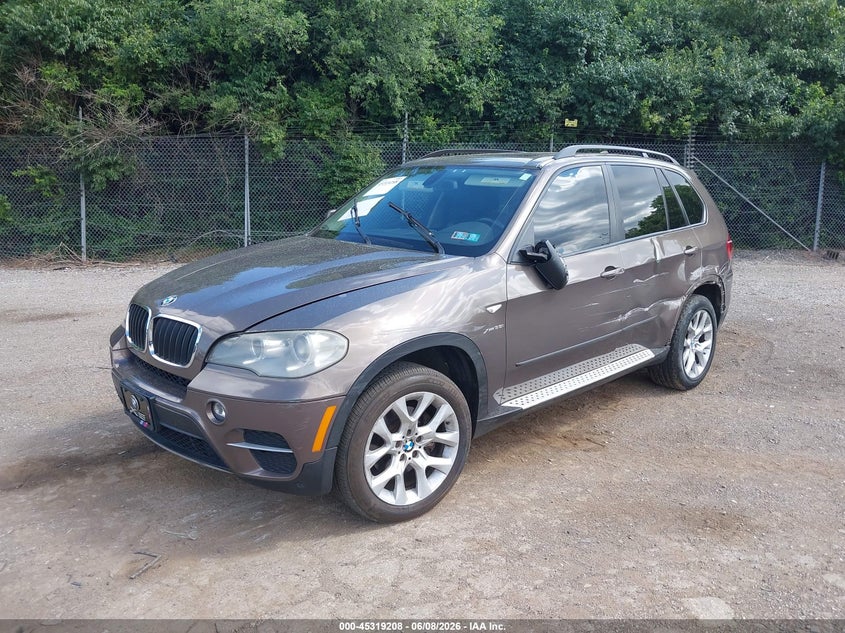 2012 BMW X5 VIN 5UXZV4C5XCL748702 IAAI salvage auction — LEFT SIDE, Salvage Title, sold $725 on 2026-07-10 (photo 2)