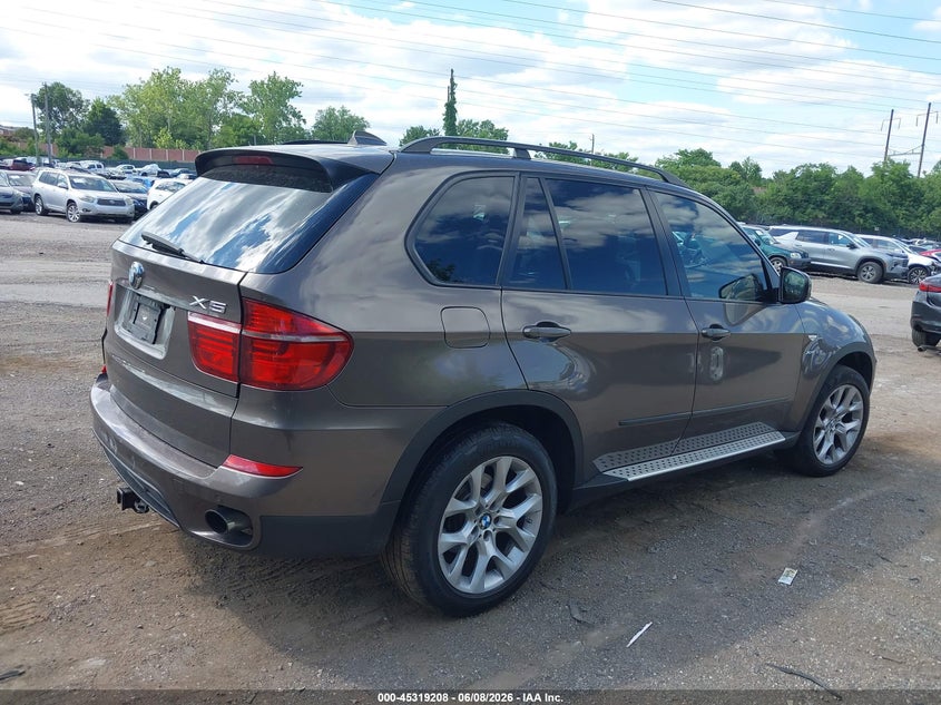2012 BMW X5 VIN 5UXZV4C5XCL748702 IAAI salvage auction — LEFT SIDE, Salvage Title, sold $725 on 2026-07-10 (photo 4)