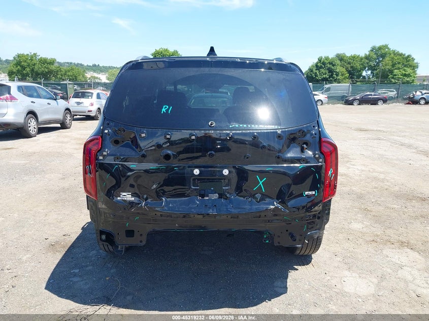 2025 Kia Telluride VIN 5XYP6DGC4SG733329 IAAI salvage auction — REAR END, Salvage Title, sold $12,600 on 2026-07-24 (photo 6)