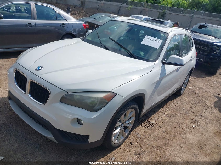 2013 BMW X1 VIN WBAVL1C59DVR90288 IAAI salvage auction — NORMAL WEAR, Clear (Wisconsin), sold $625 on 2026-07-15 (photo 2)
