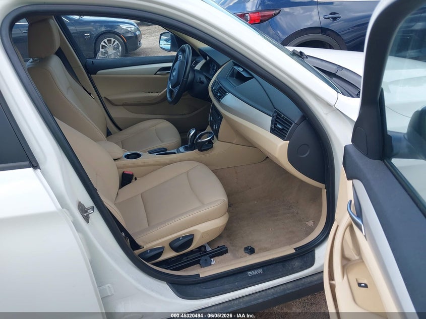 2013 BMW X1 VIN WBAVL1C59DVR90288 IAAI salvage auction — NORMAL WEAR, Clear (Wisconsin), sold $625 on 2026-07-15 (photo 5)