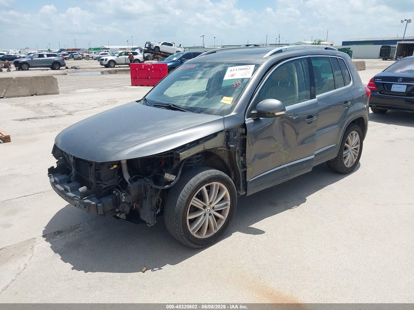 2013 Volkswagen Tiguan VIN WVGBV3AX2DW623867 IAAI salvage auction — LEFT SIDE, Salvage Title, sold $700 on 2026-07-29 (photo 2)