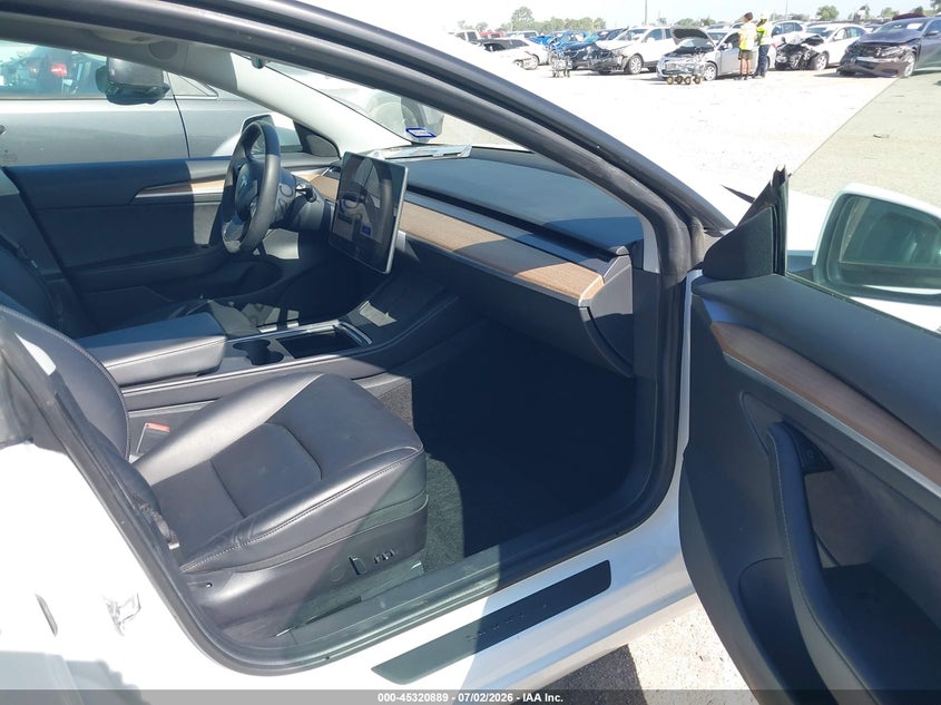 2021 Tesla Model 3 VIN 5YJ3E1EA7MF051377 IAAI salvage auction — LEFT FRONT, Salvage (Texas), sold $8,100 on 2026-07-28 (photo 5)