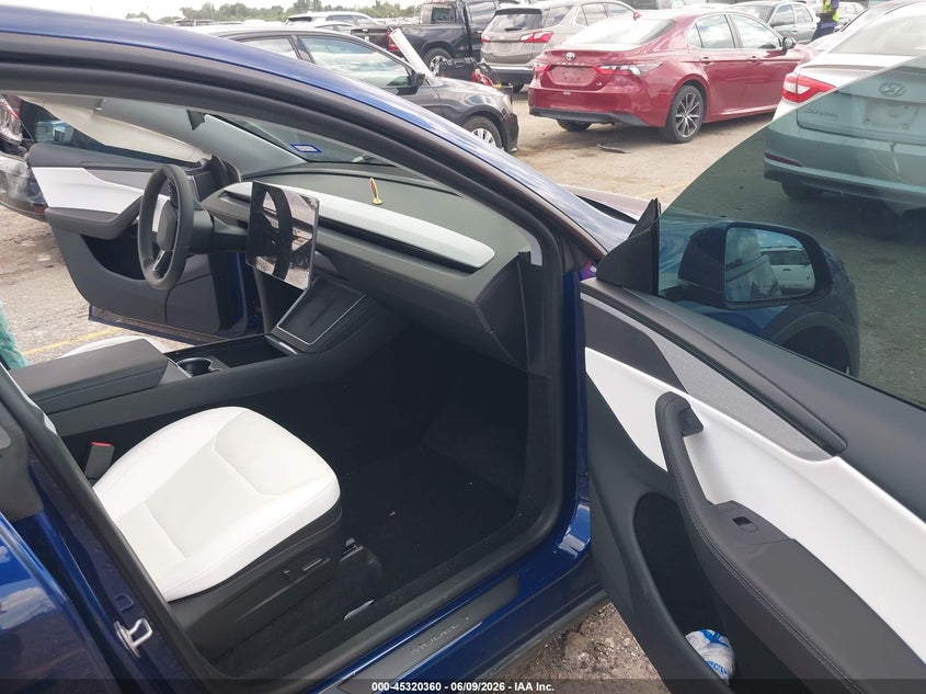 2026 Tesla Model y VIN 7SAYGDEE9TA426205 IAAI salvage auction — SUSPENSION, Salvage Title, sold $17,350 on 2026-09-10 (photo 5)