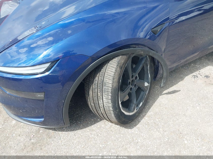 2026 Tesla Model y VIN 7SAYGDEE9TA426205 IAAI salvage auction — SUSPENSION, Salvage Title, sold $17,350 on 2026-09-10 (photo 6)
