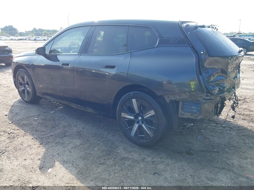 2025 BMW Ix VIN WB523CF04SCS15712 IAAI salvage auction — REAR END, Salvage Title, sold $32,700 on 2026-08-24 (photo 3)