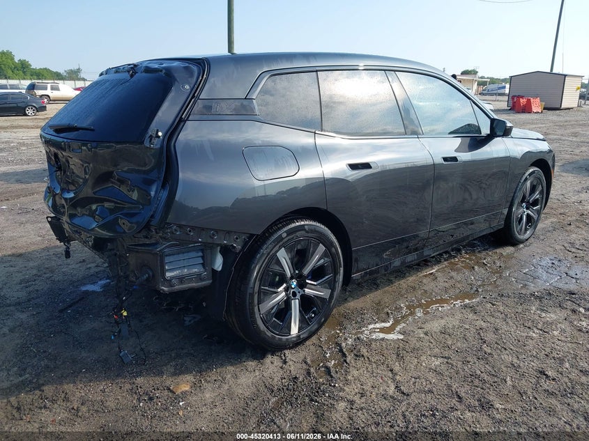 2025 BMW Ix VIN WB523CF04SCS15712 IAAI salvage auction — REAR END, Salvage Title, sold $32,700 on 2026-08-24 (photo 4)
