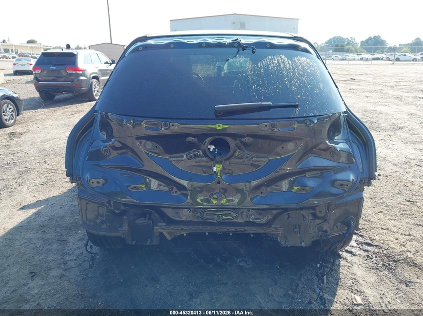 2025 BMW Ix VIN WB523CF04SCS15712 IAAI salvage auction — REAR END, Salvage Title, sold $32,700 on 2026-08-24 (photo 6)