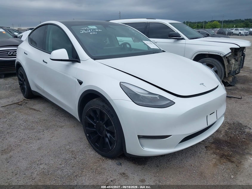 2023 Tesla Model y VIN 7SAYGDEE5PF607665 IAAI salvage auction — LEFT REAR, Salvage (Florida), sold $12,900 on 2026-07-08 (photo 1)