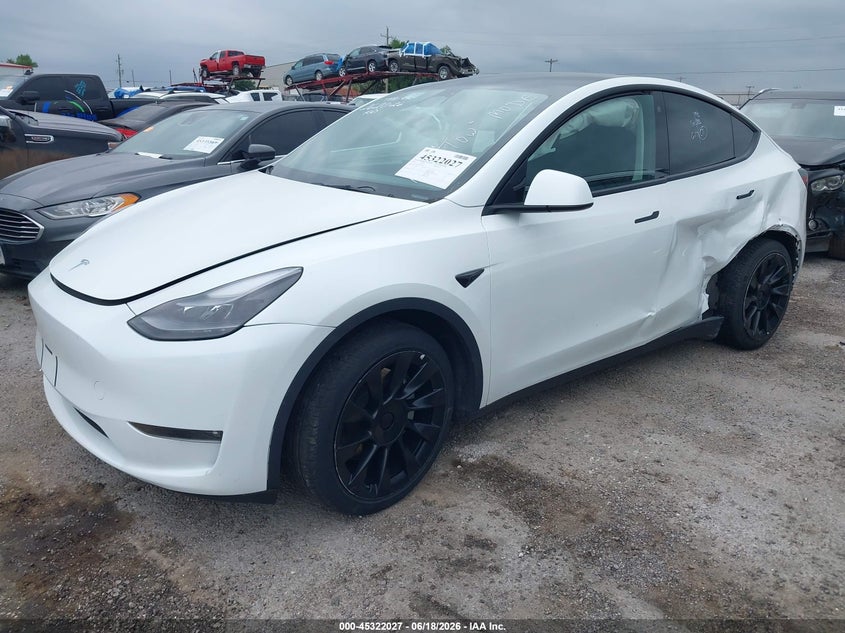 2023 Tesla Model y VIN 7SAYGDEE5PF607665 IAAI salvage auction — LEFT REAR, Salvage (Florida), sold $12,900 on 2026-07-08 (photo 2)