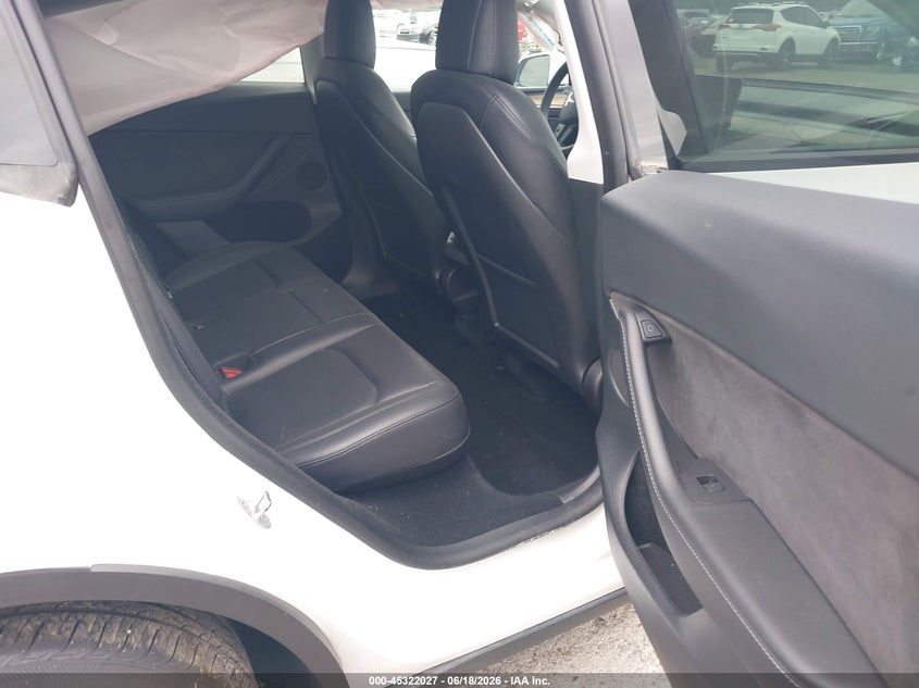 2023 Tesla Model y VIN 7SAYGDEE5PF607665 IAAI salvage auction — LEFT REAR, Salvage (Florida), sold $12,900 on 2026-07-08 (photo 8)