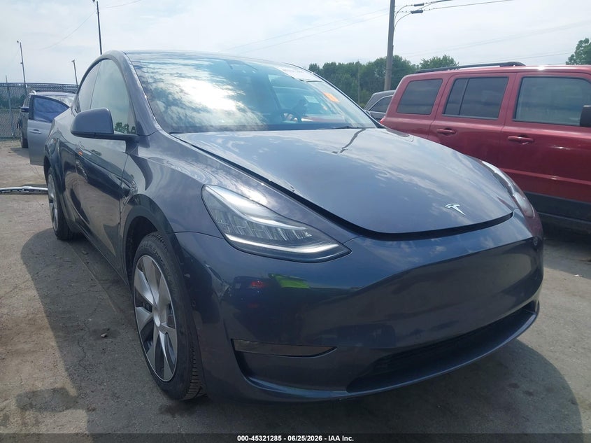 2022 Tesla Model y VIN 7SAYGAEE0NF377366 IAAI salvage auction — HAIL, Salvage (Ohio), sold $12,500 on 2026-07-21 (photo 1)
